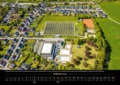 Ortsansicht Alme und Alme-Arena Fußballstadion BV 23 Alme mit Tennisplätzen TC Alme 77, Freibad und Gemeindehalle, Reihenhäuser, Wohnsiedlung Burgstr. und Bahnhof, Ortsteil Oberalme – Foto: Hans Blossey – Brilon 2027